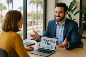 business owner meeting with web design and SEO consultant in Tampa Bay office discussing website growth strategies